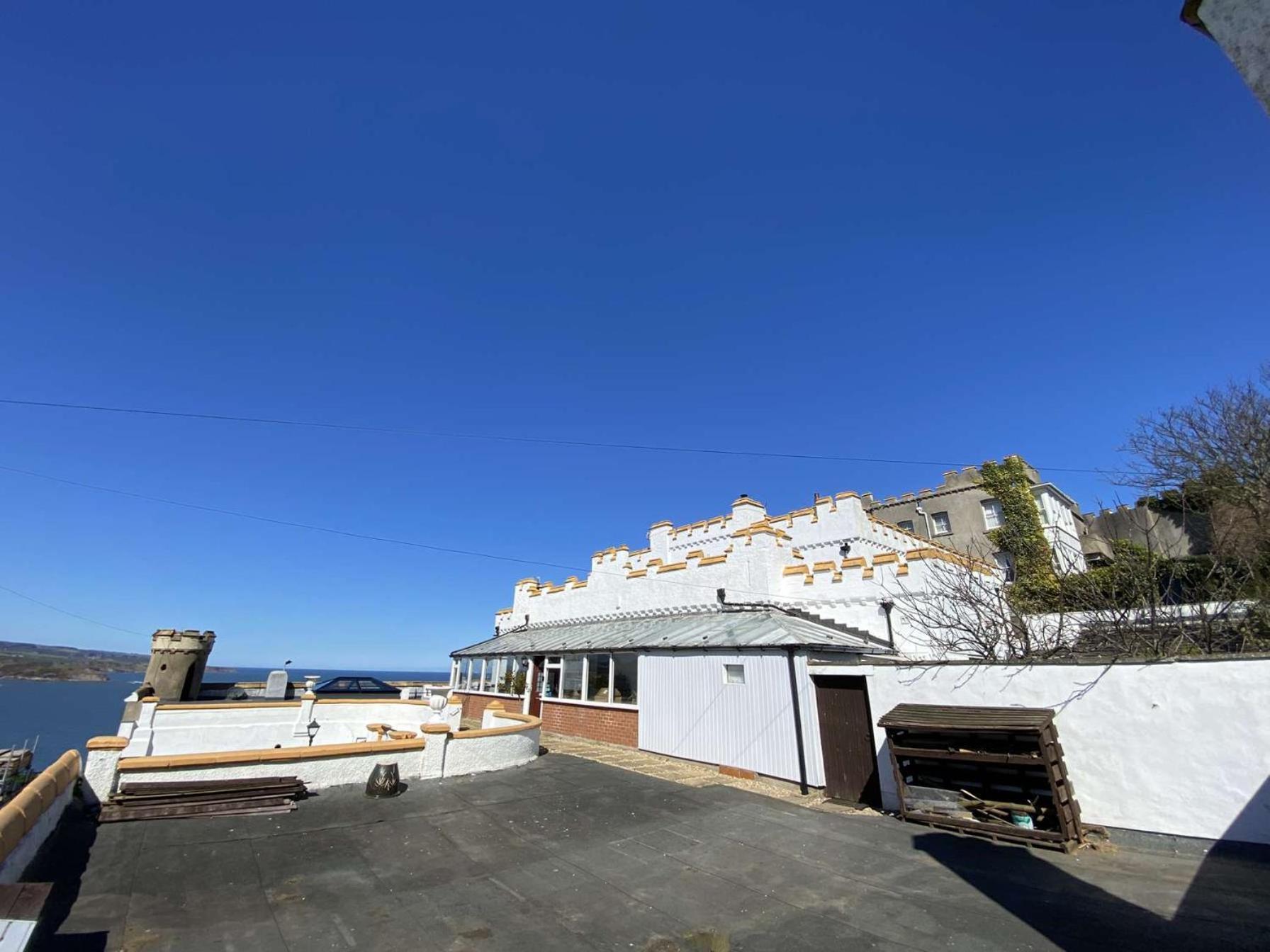 Casa de hóspedes Castle By The Sea
